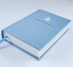 Biblia Católica en español. Tapa dura azul, con Virgen Milagrosa en cubierta