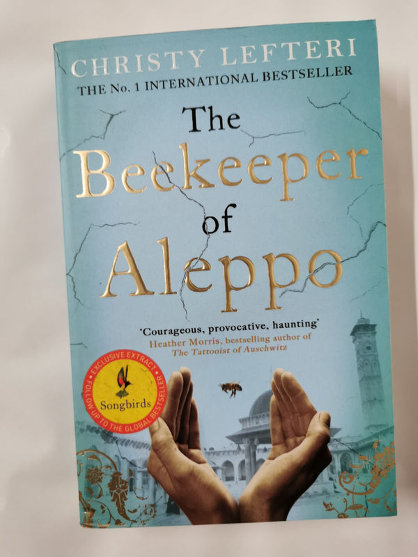 The Beekeeper of Aleppo: The heartbreaking tale that everyone's talking about by Christy Lefteri - used book at Perkology Books