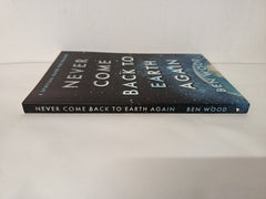 Never Come Back to Earth Again by Ben Wood (Paperback, 2023) by Ben Wood - used book at Perkology Books