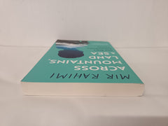 Across Mountains, Land and Sea: One Boy’s Extraordinary Journey by Mir Rahimi - used book at Perkology Books