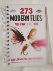Book titled '273 Modern Flies and How to Tie Them' with fishing flies on the cover.