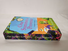 One Summer in Provence: 'Vines and olives and love ... a superb read!' by Carol Drinkwater - used book at Perkology Books