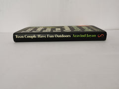 Teen Couple Have Fun Outdoors by Aravind Jayan (Hardcover, 2022)