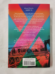 SAINT X - INTERNATIONAL EDITION by ALEXIS SCHAITKIN