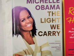 The Light We Carry by Michelle Obama & Reach Higher by Amanda Lucidon